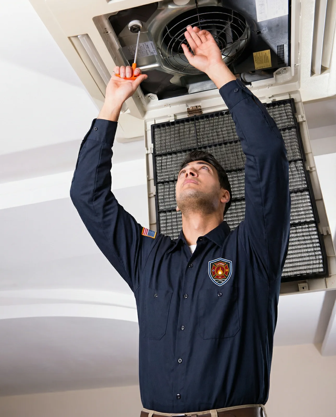 Technician checking HVAC vent system